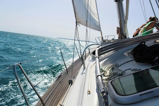 New boat owners navigating the water on a sunny day